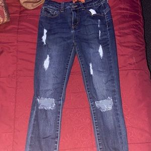 ripped blue skinny jeans